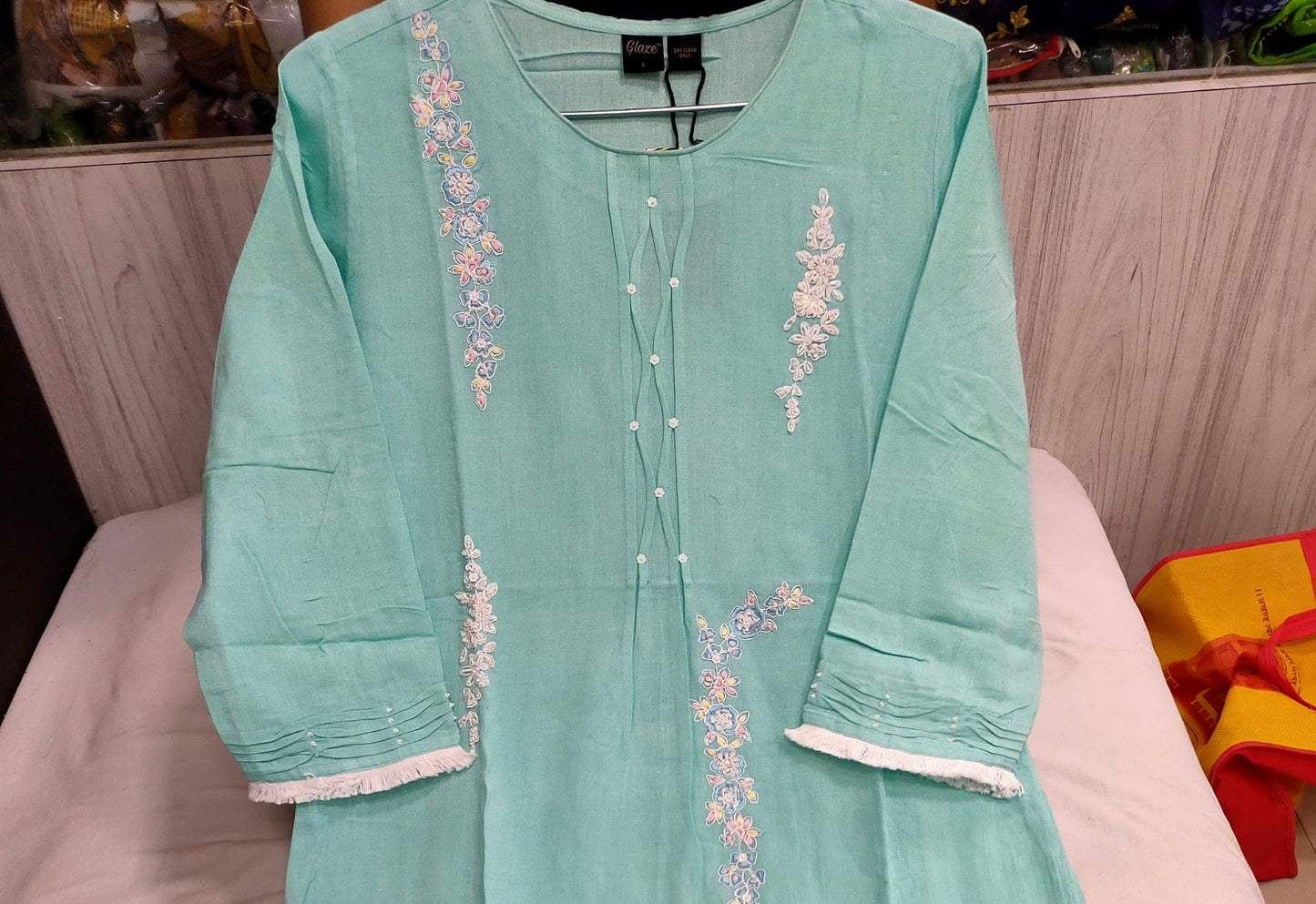 Kurta with round neck having Floral Embroidery