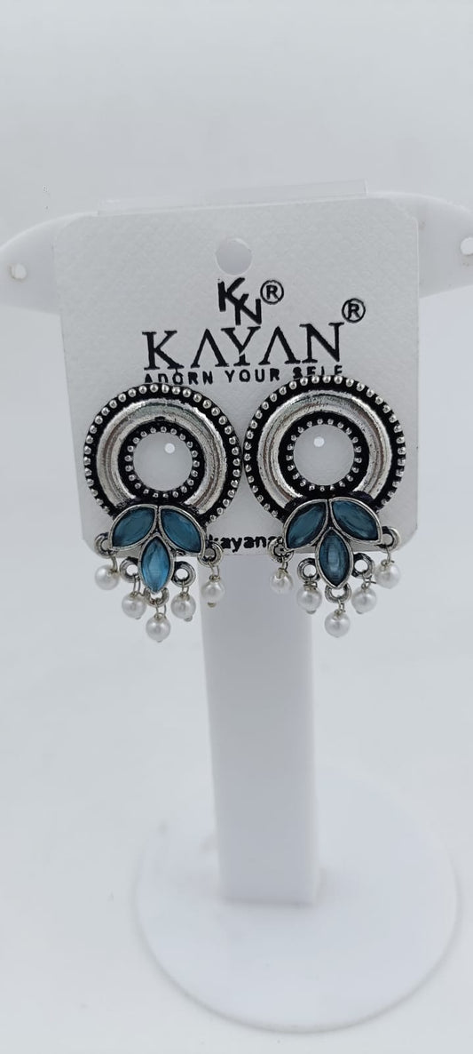Designer Round silver Earrings  in Paris