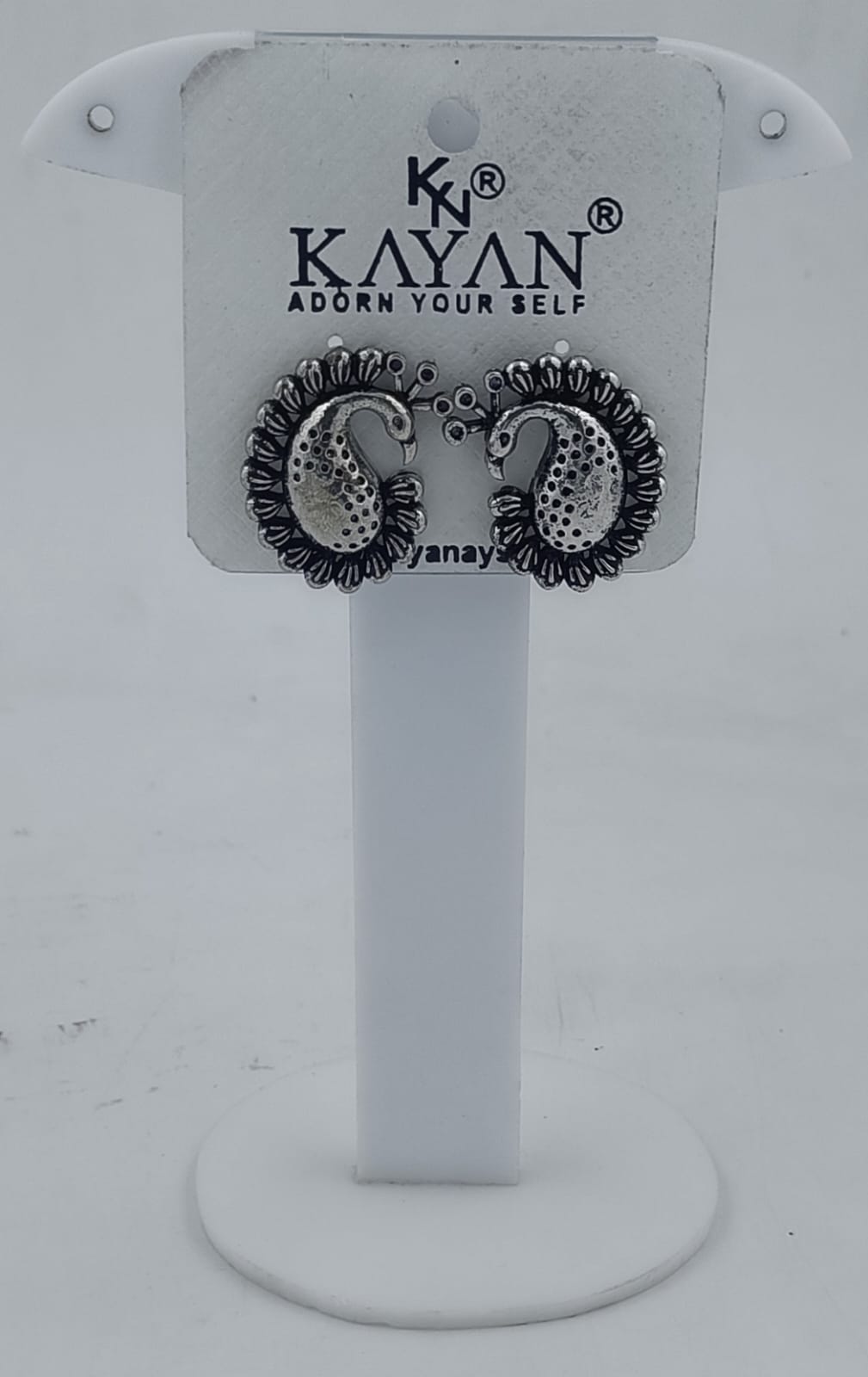 PEACOCK EARRING IN BERLIN