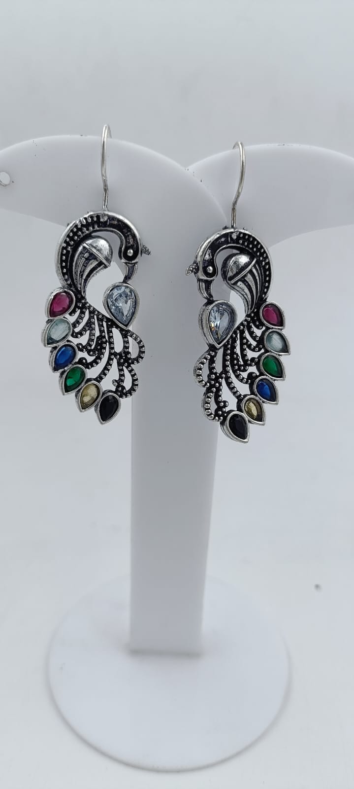Peacock Gemstone Studded Intricate Oxidised Silver Plated Earrings in Munich