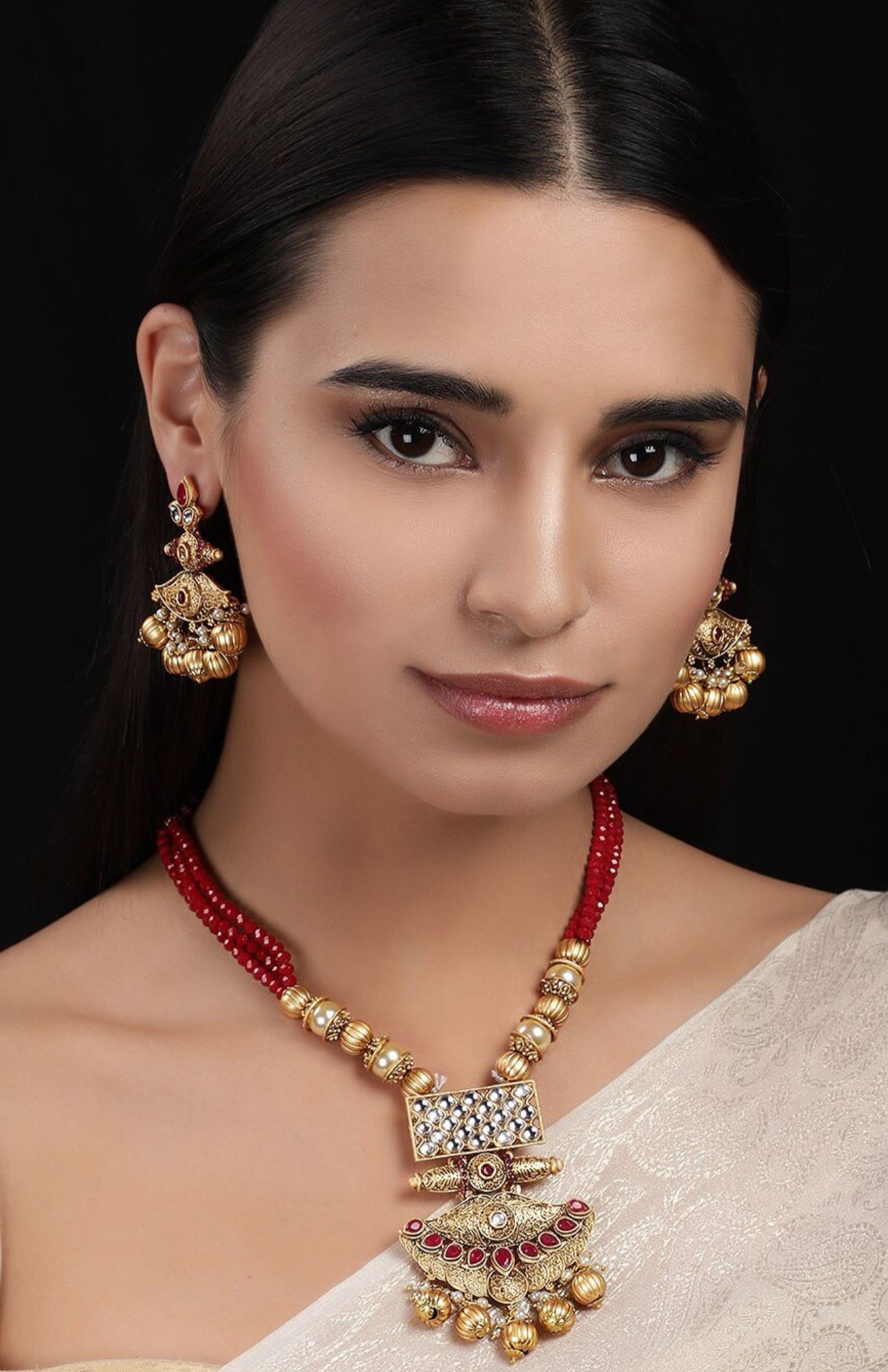 Women Anrique Gold-Toned & Red Embellished Temple Jewellery Set