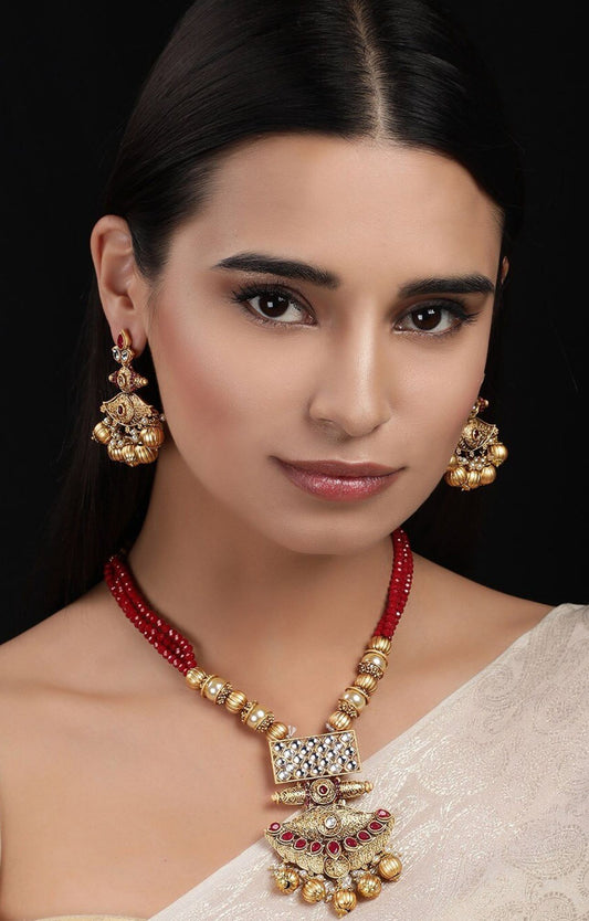 Women Anrique Gold-Toned & Red Embellished Temple Jewellery Set