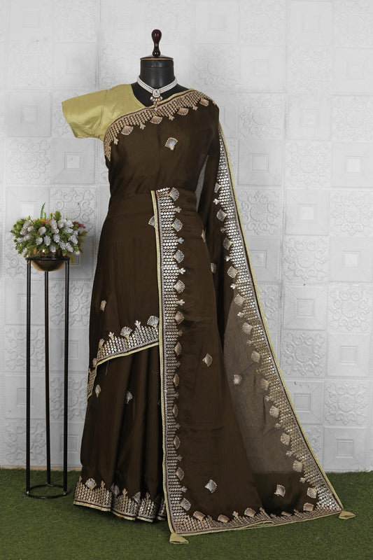 Beautiful brown organza saree with stitched blouse in Germany