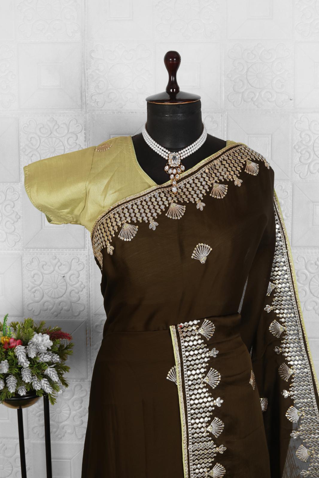 Beautiful brown organza saree with stitched blouse in Germany