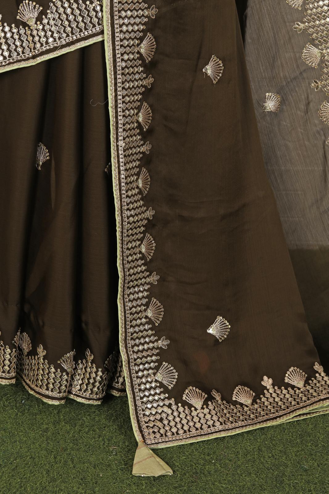 Beautiful brown organza saree with stitched blouse in Germany