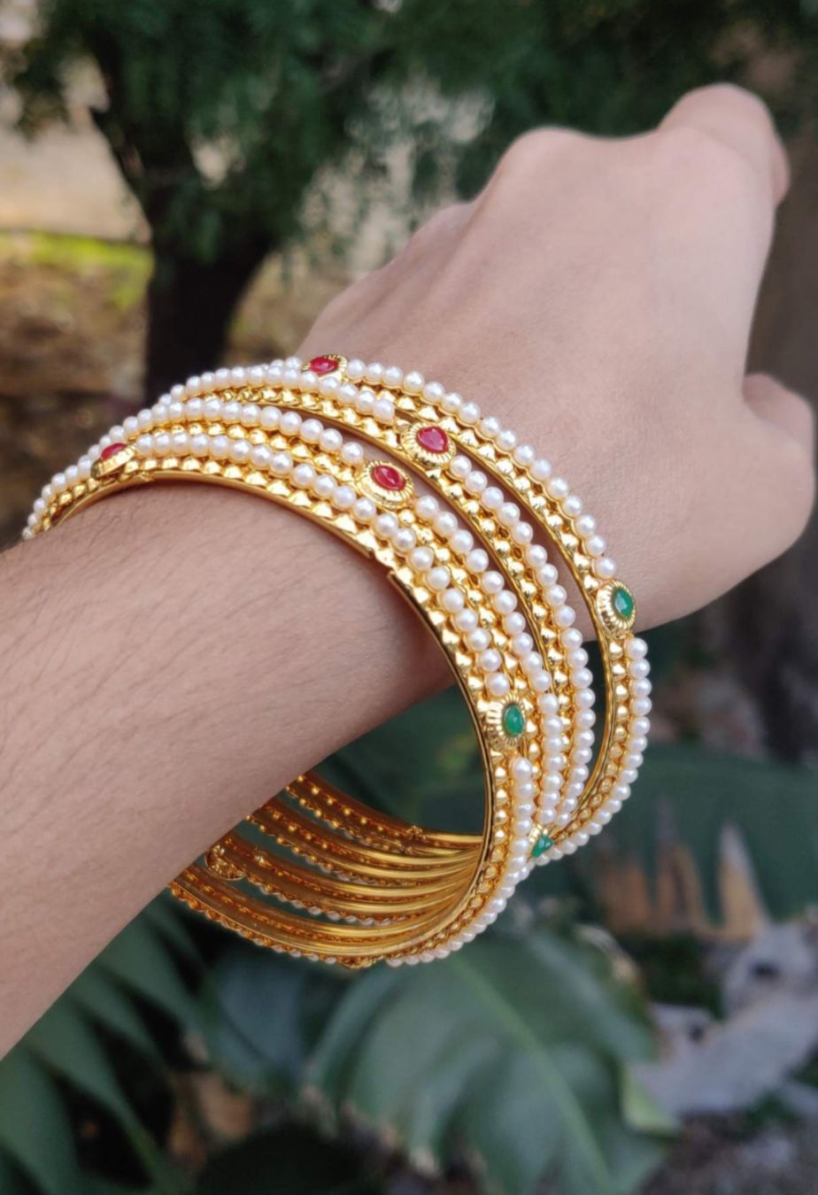 Mad Club elegant pearls studded gold plated 4 pcs bangles set in Munich