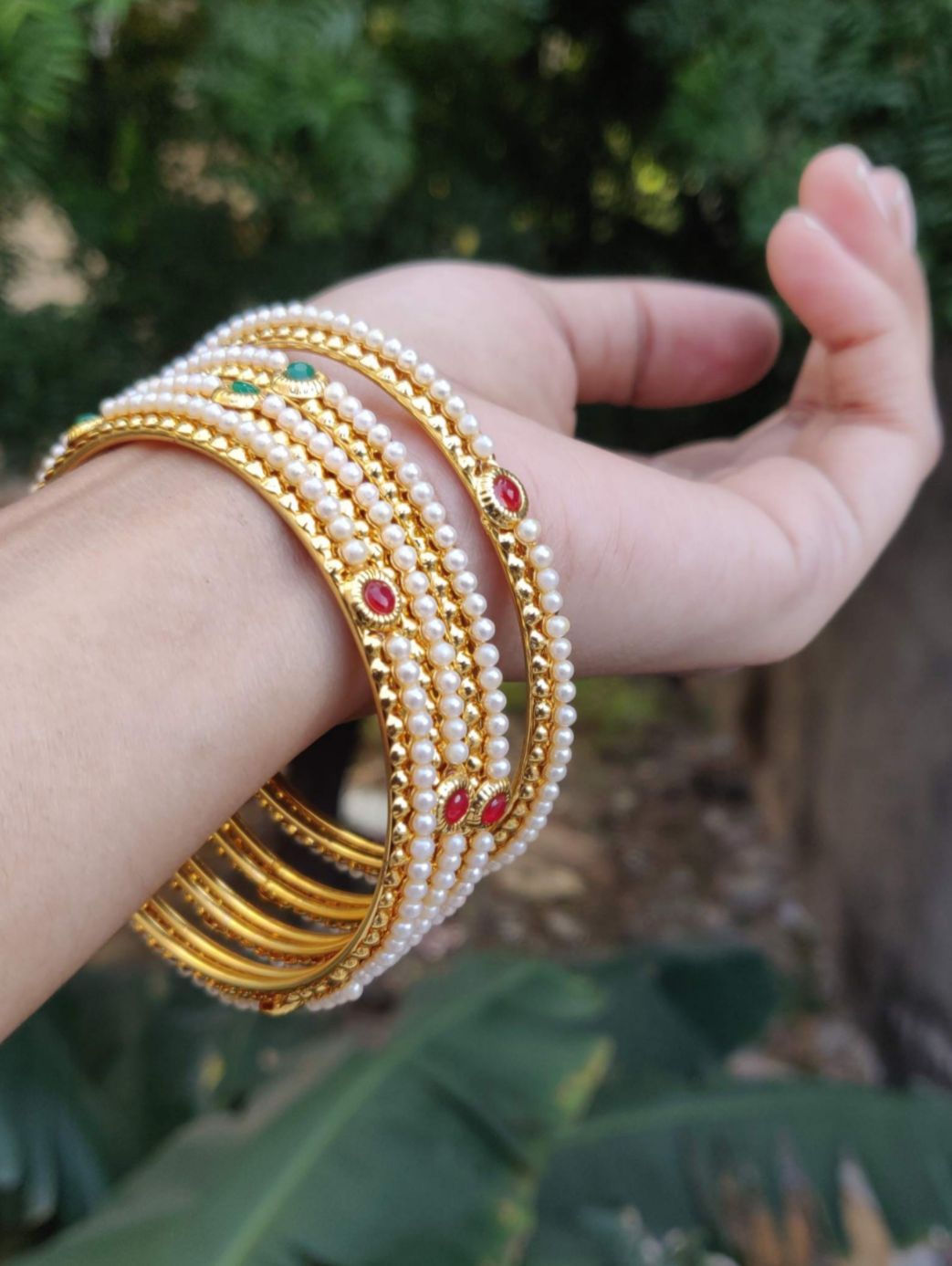Mad Club elegant pearls studded gold plated 4 pcs bangles set in Munich