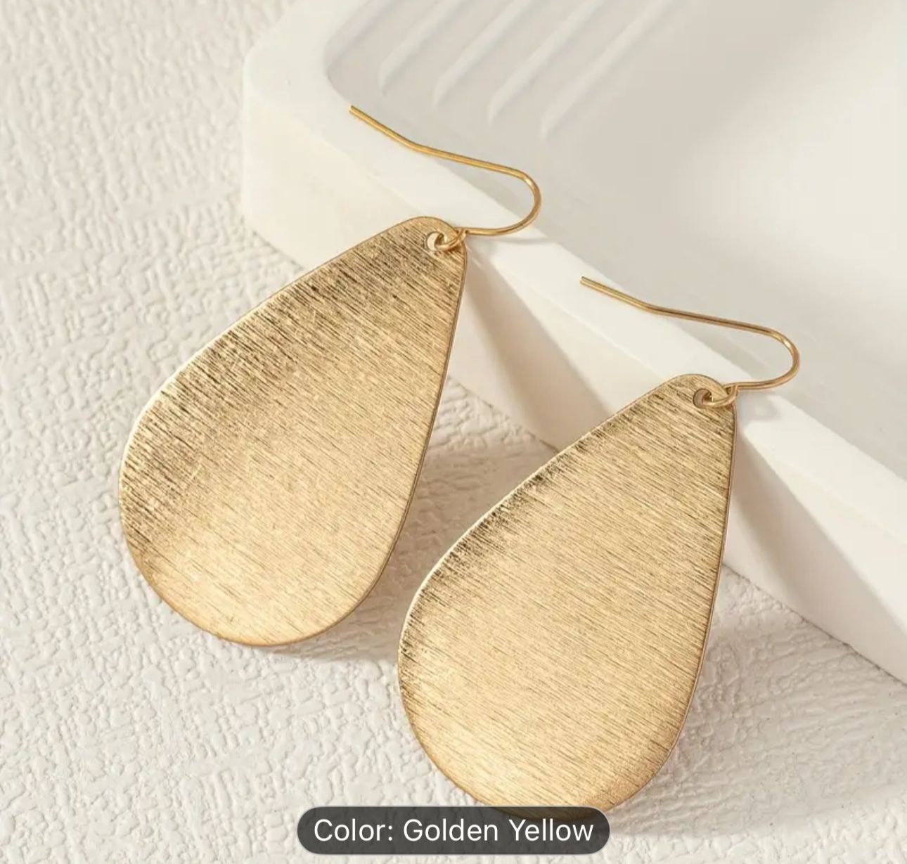 Golden Brushed Metal Teardrop-Shaped Earrings in Germany