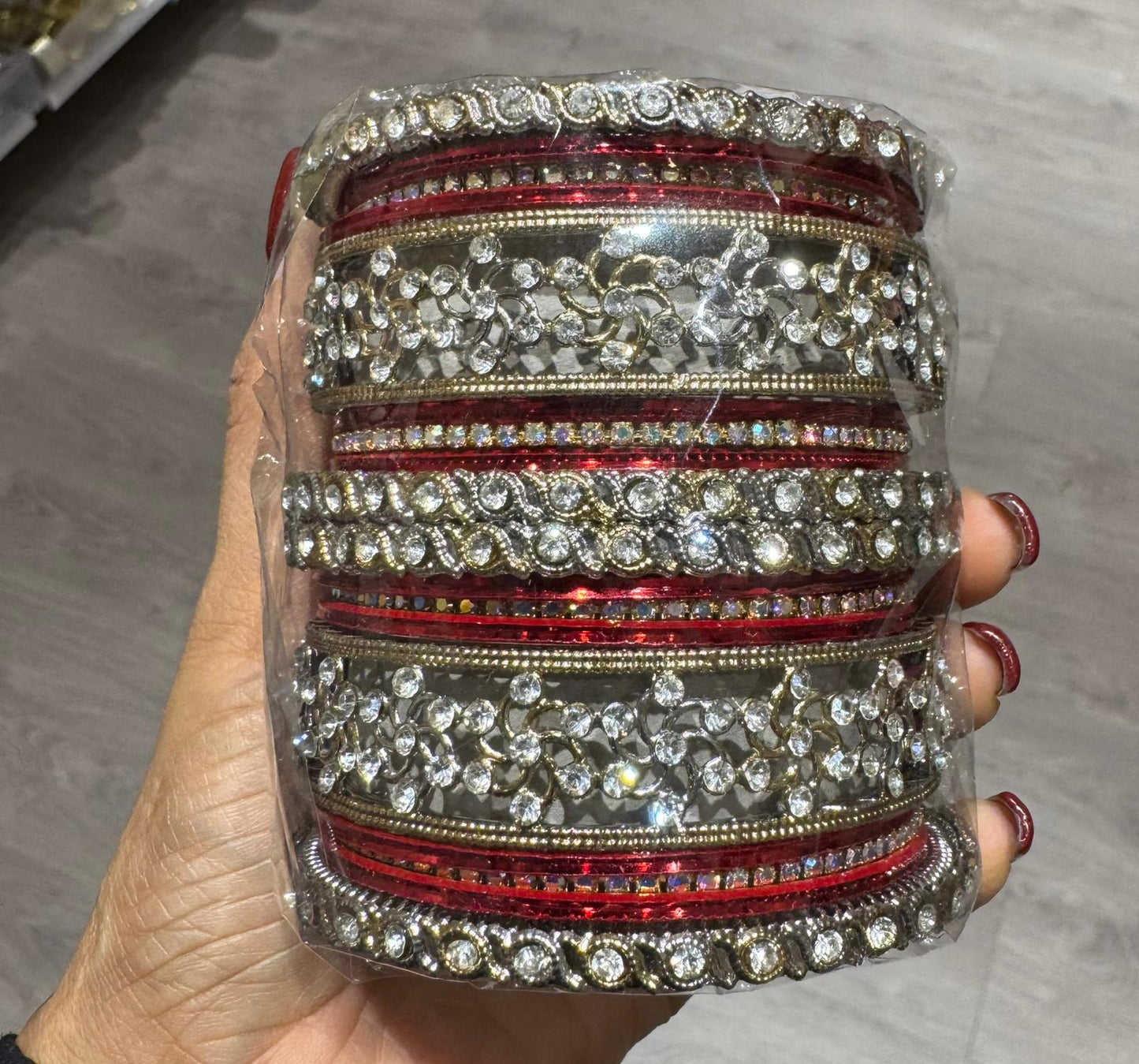 Red Kundan bangles set in Germany