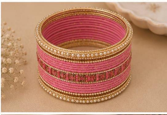 Elegant pink and gold traditional bangle set in Germany