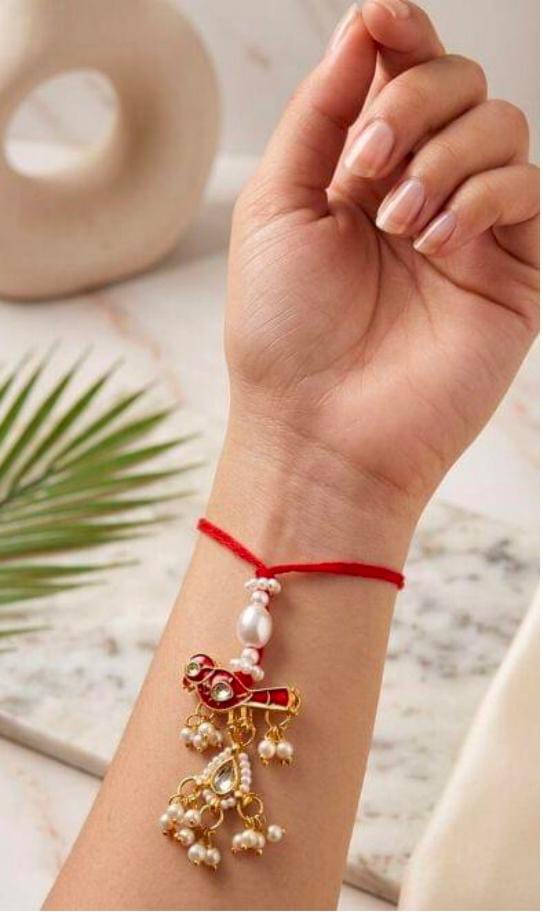 Red Bird Enamel Lumba Rakhi in Germany