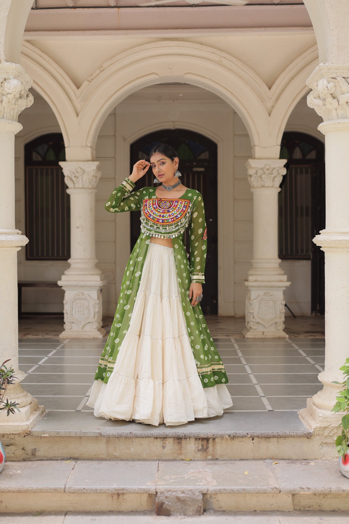 Green Bandhani Front-Slit Kurti and Off-White Lehenga Set in Germany