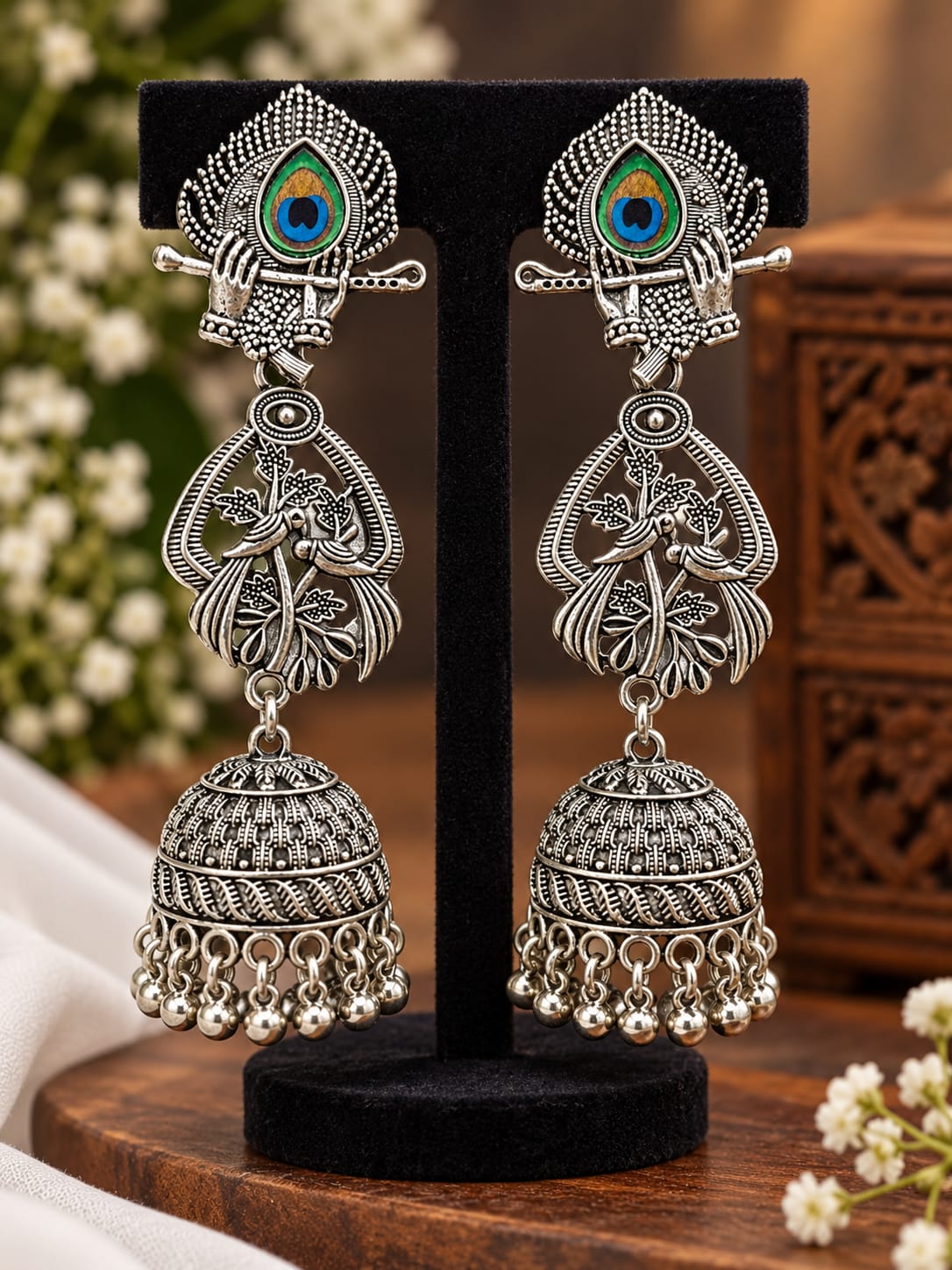 Lord Krishna Flute & Peacock Feather Oxidised Jhumka Earrings in Germany