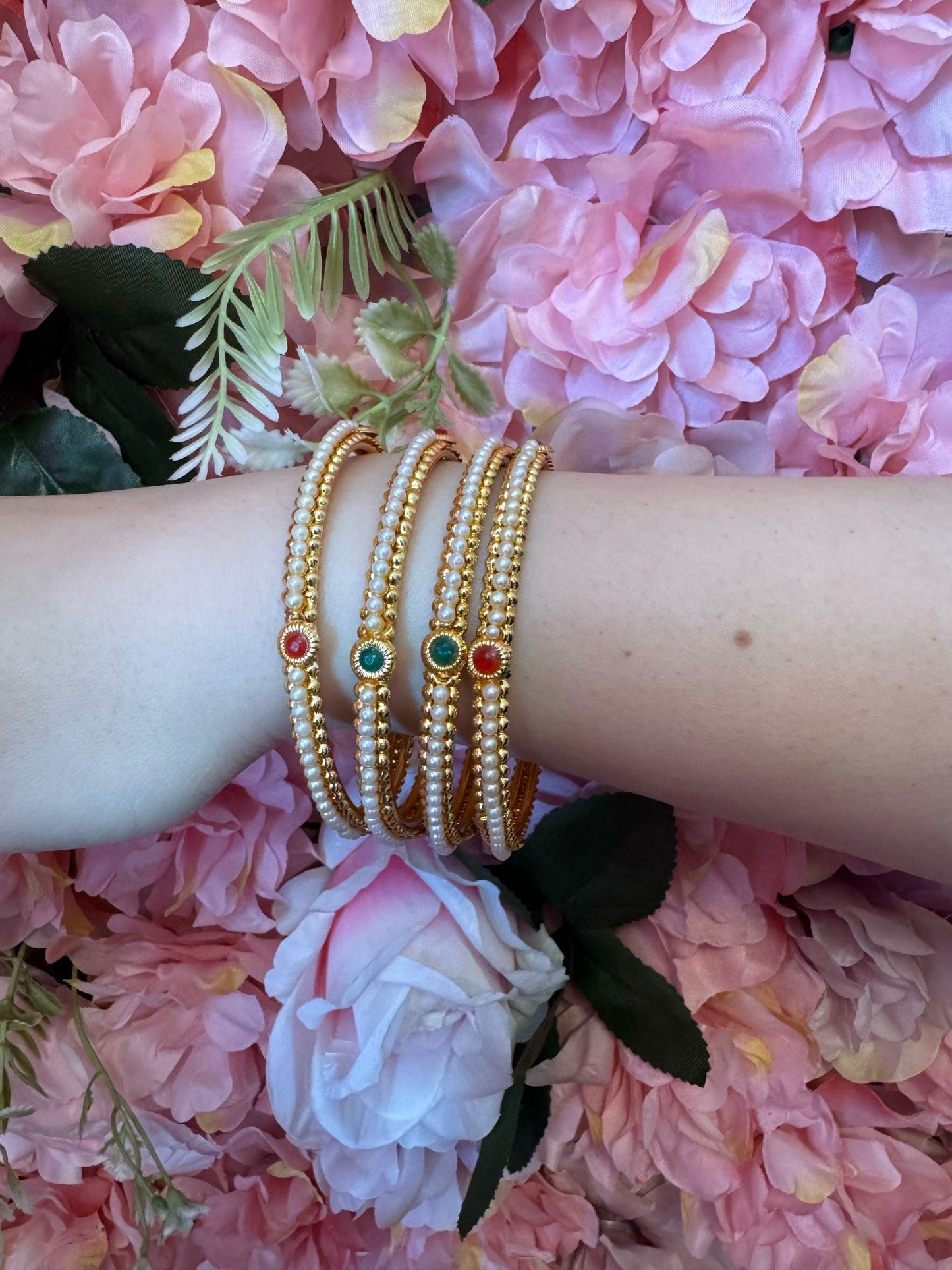Mad Club elegant pearls studded gold plated 4 pcs bangles set in Munich