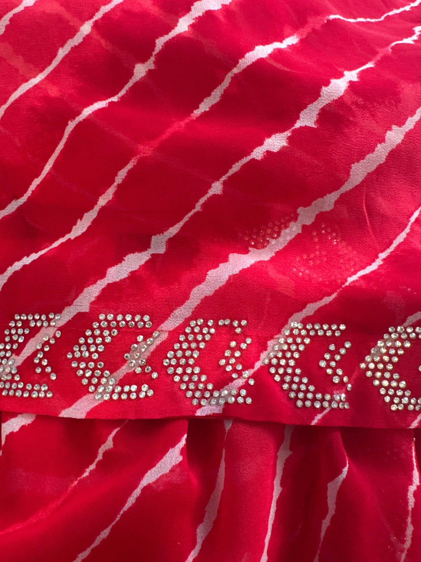 Leheriya Printed Georgette Saree with   Jharkan Diamond stone In Red With Unstitched Blouse