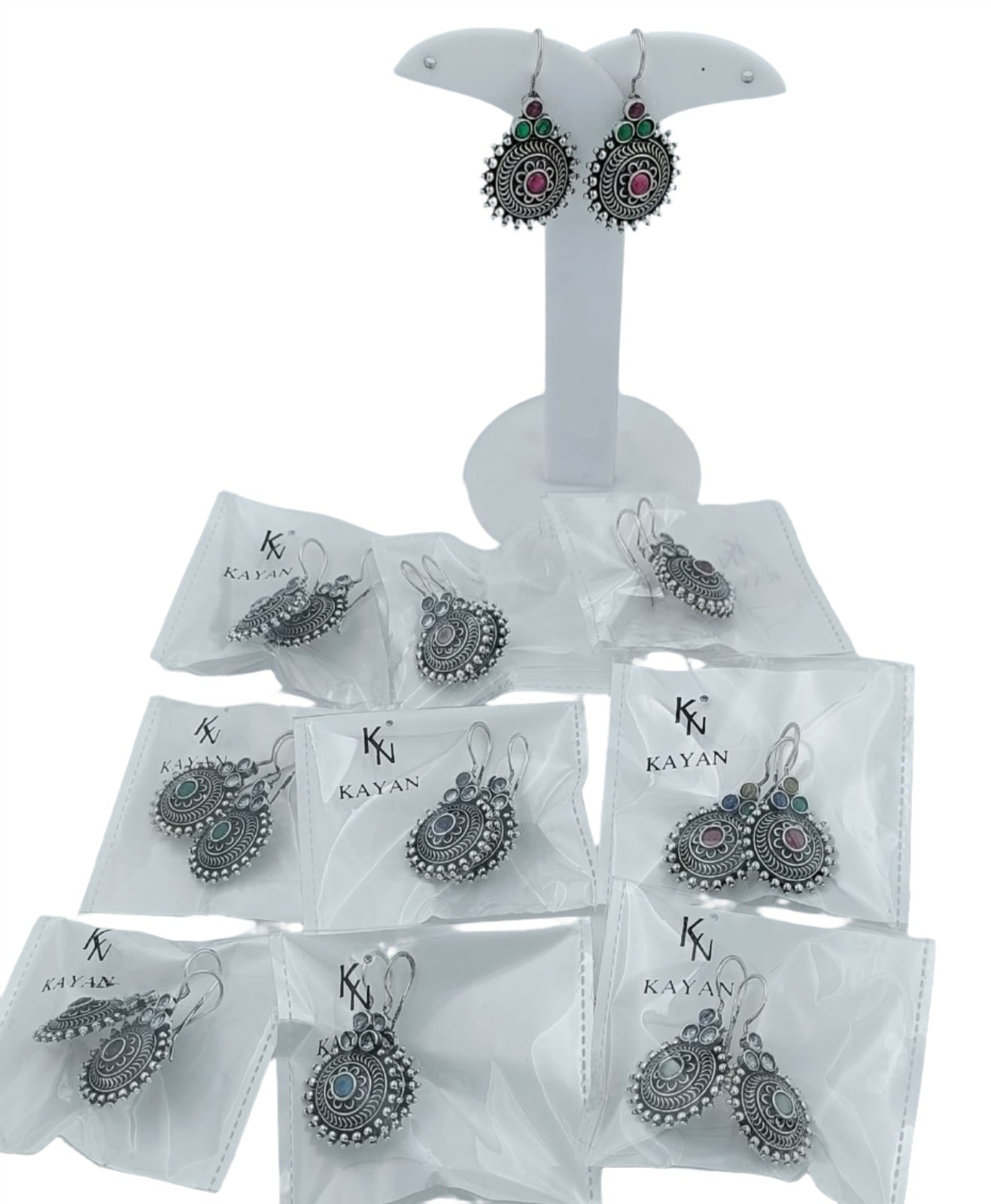 SILVER TONED SUN MOTIF BRASS EARRING in Germany