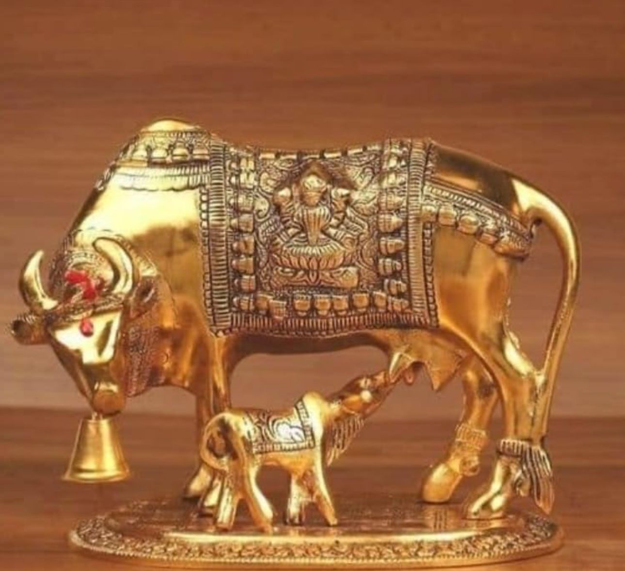 Metal Illuminati Kart-Golden Kamdhenu Cow With Calf Statue in Germany