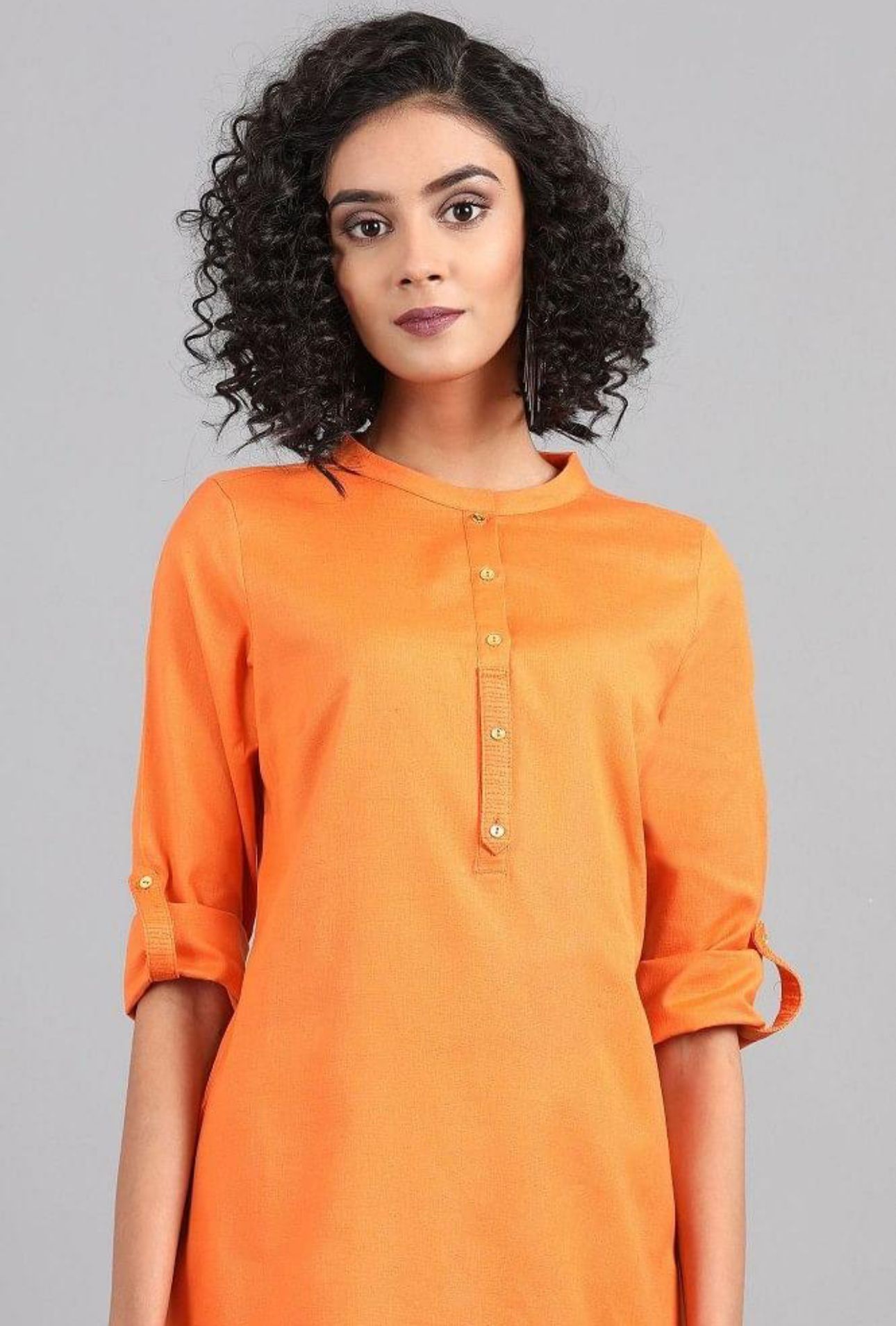 Orange Mandarin Neck Solid kurta in Germany