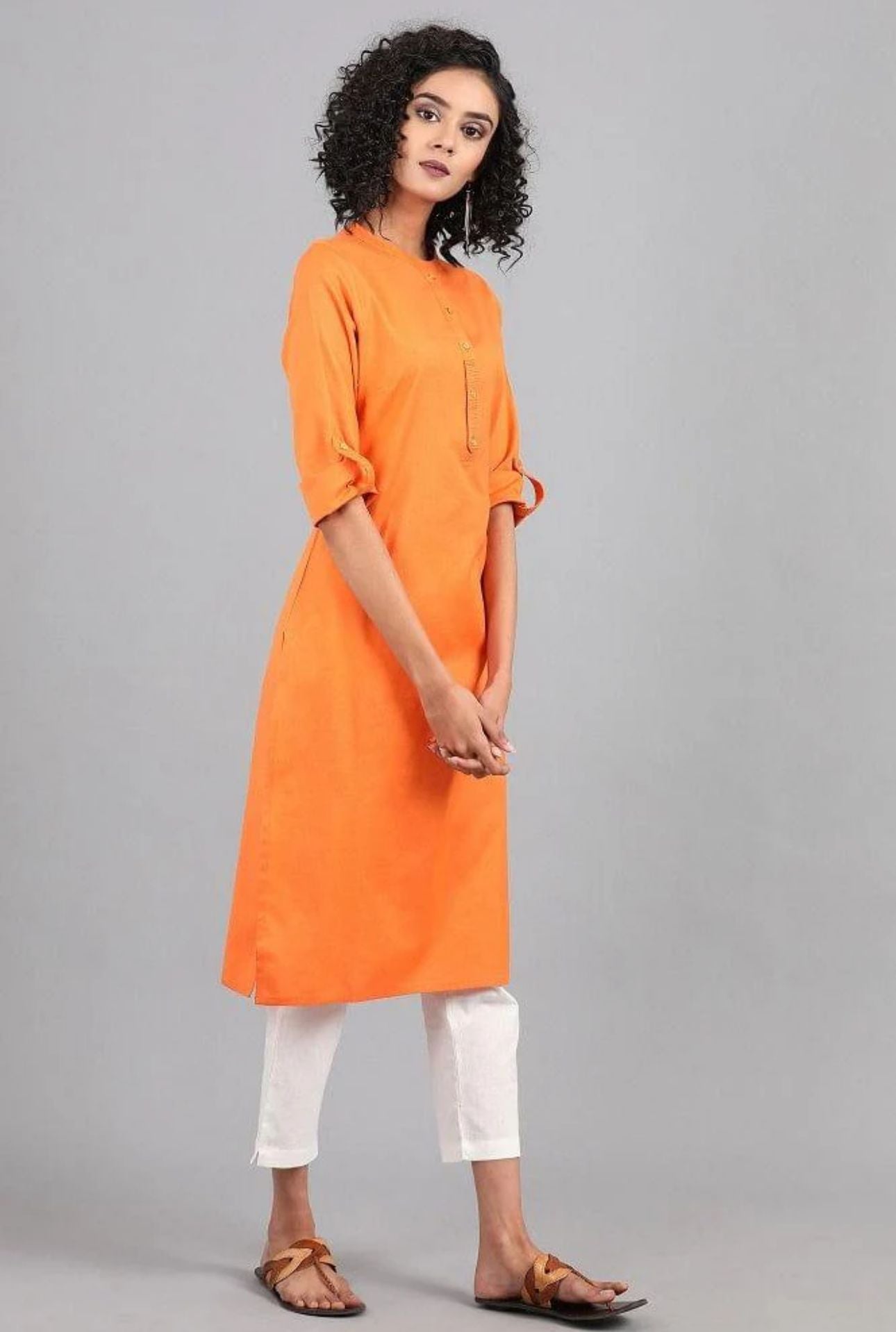 Orange Mandarin Neck Solid kurta in Germany