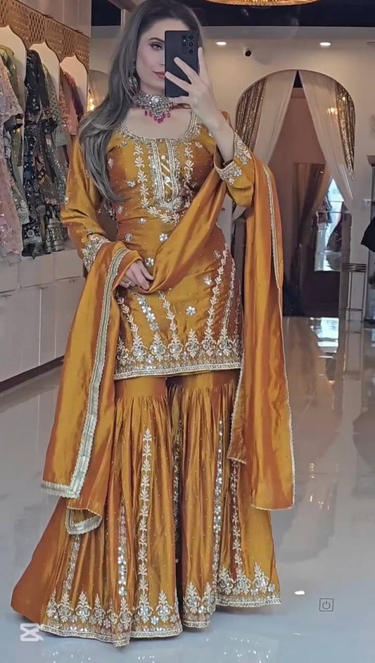 Pretty Heavy Faux Georgette Suit embroidery and fabric detail - Neha Couture Indian Fashion