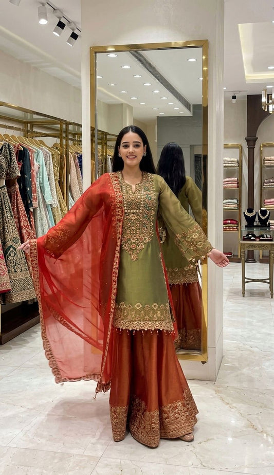 Green Heavy Multi Thread Embroidery Sequence Work Suit embroidery and fabric detail - Neha Couture Indian Fashion