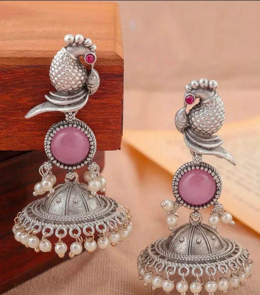 Traditional peacock oxidized silver jhumka earrings in Berlin