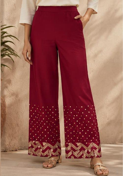 Ethnic women's wide-leg parallel palazzo pants in a deep maroon tone in Berlin