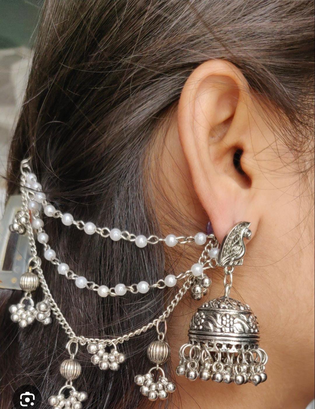 Oxidized Silver Bahubali Jhumka Earrings with Multi-Layered Pearl and Ghungroo Ear Chains (Sahara) in Germany