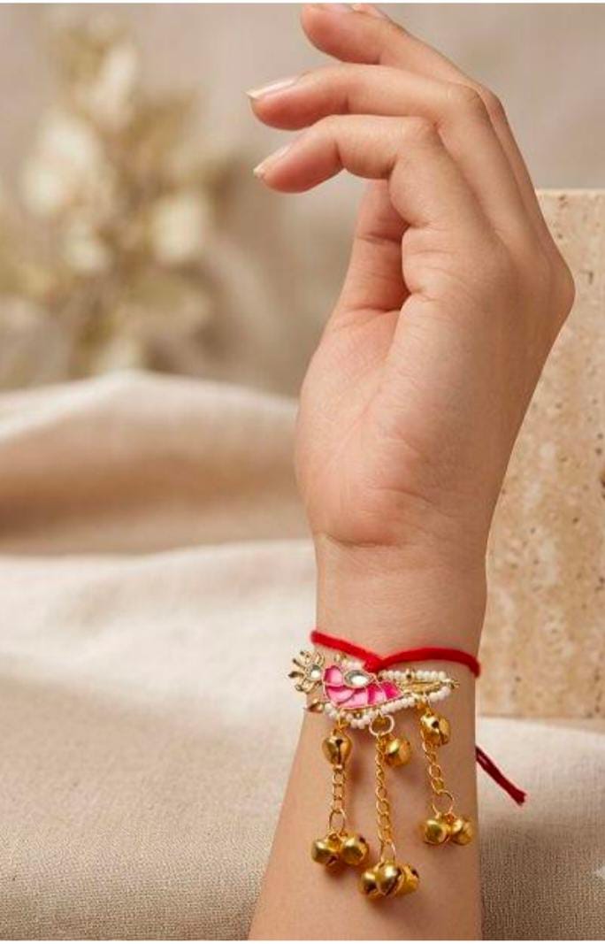 Handcrafted Pink Meenakari Lumba Rakhi with Hanging Ghungroo Bells in Germany