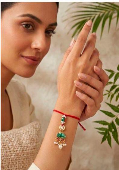 Elegant Lotus Meenakari Rakhi/Lumba in Germany