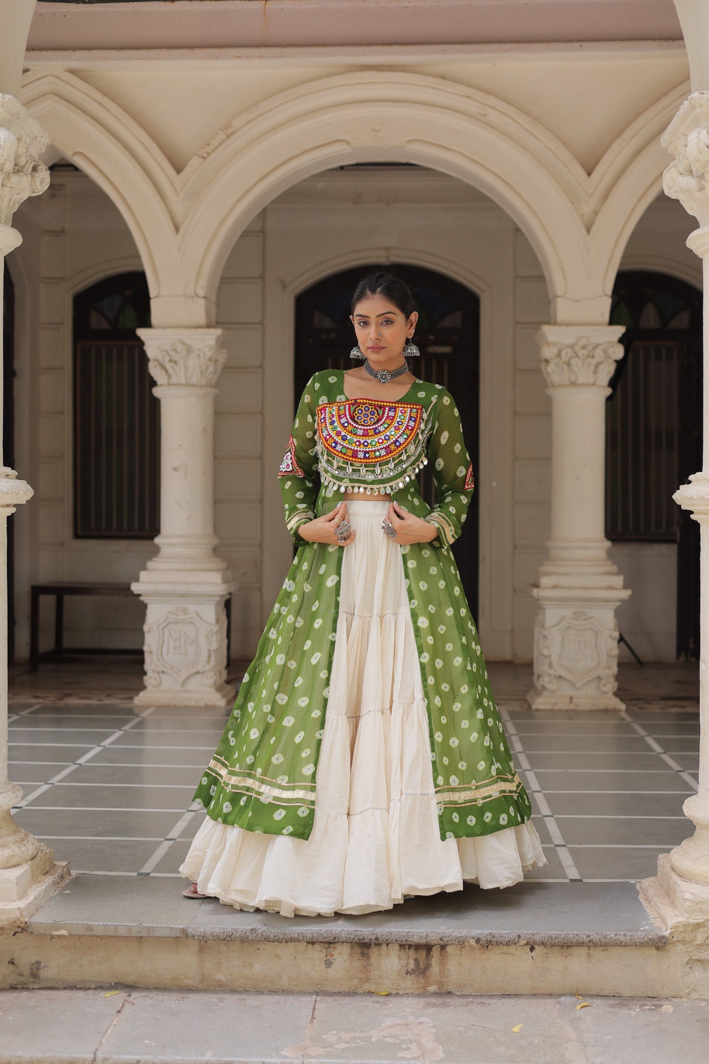 Green Bandhani Front-Slit Kurti and Off-White Lehenga Set in Germany