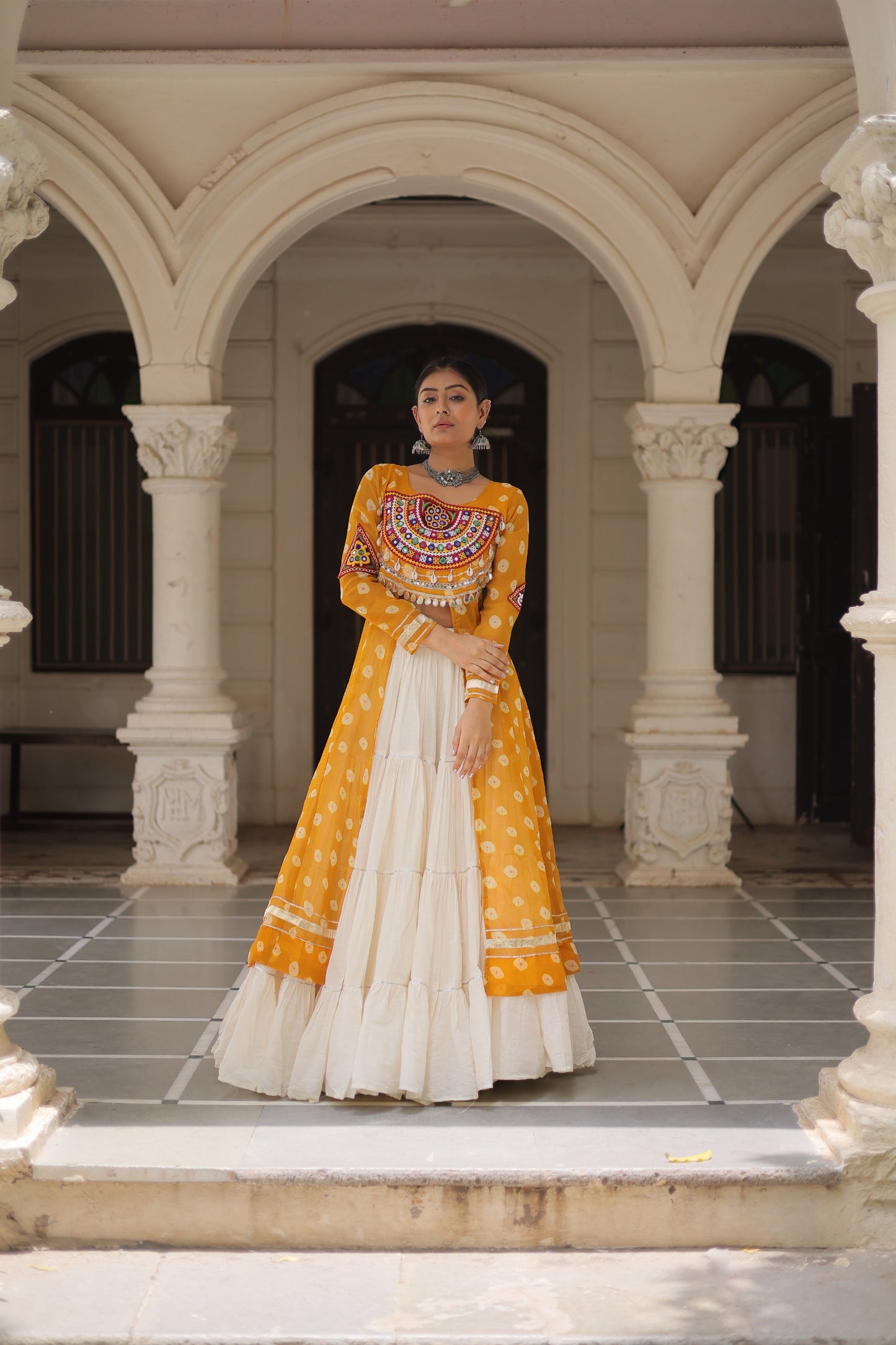 Yellow Bandhani Front-Slit Kurti and Off-White Lehenga Set in Germany