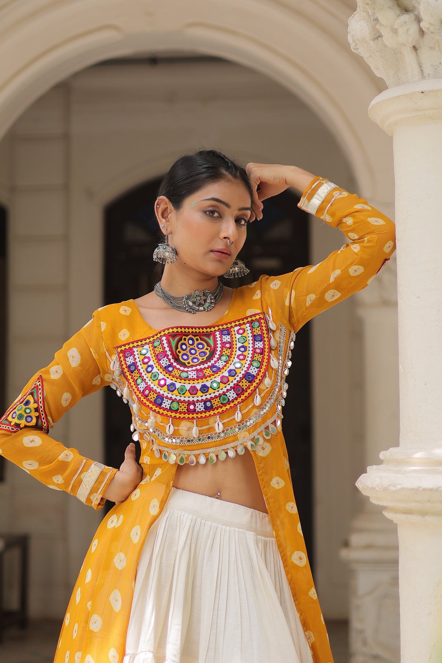 Yellow Bandhani Front-Slit Kurti and Off-White Lehenga Set in Germany