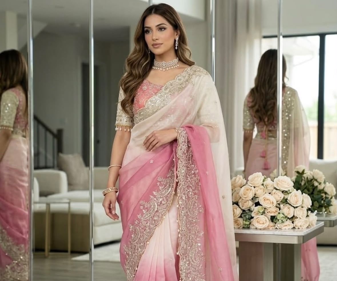 Pink and cream ombre designer saree paired with an intricately embroidered Stitched blouse in Germany