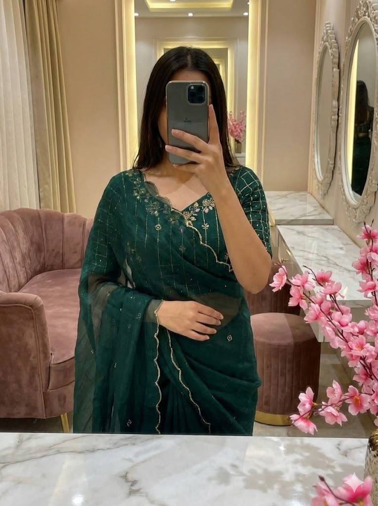 Bottle Green Organza/Silk Saree with Scalloped Border and Embroidered stitched Blouse in Germany