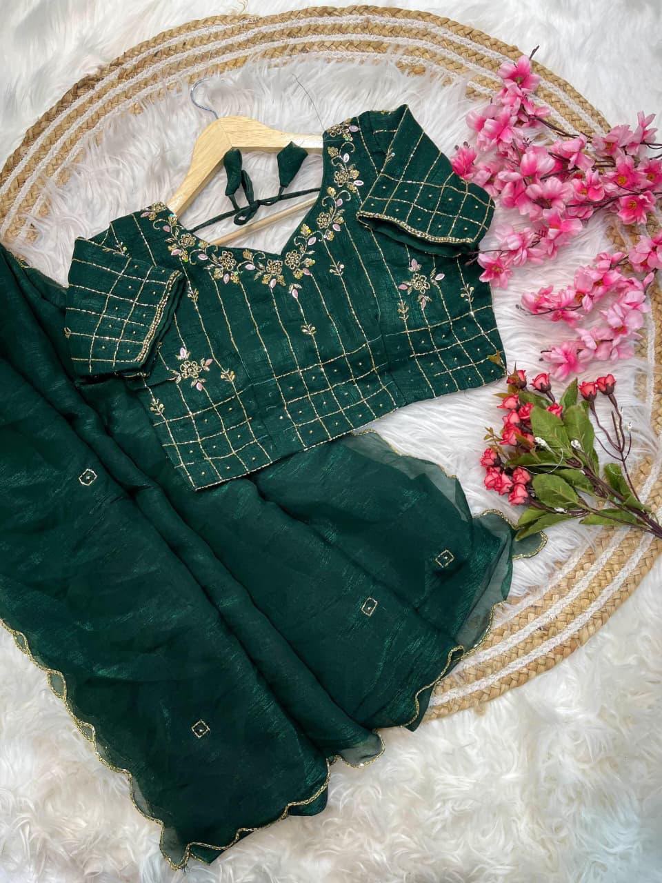 Bottle Green Organza/Silk Saree with Scalloped Border and Embroidered stitched Blouse in Germany