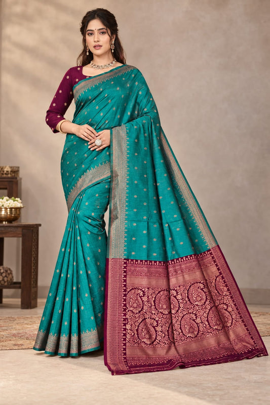 Elegant Teal Banarasi Soft Silk Saree with a Rich Magenta Zari Border in Germany