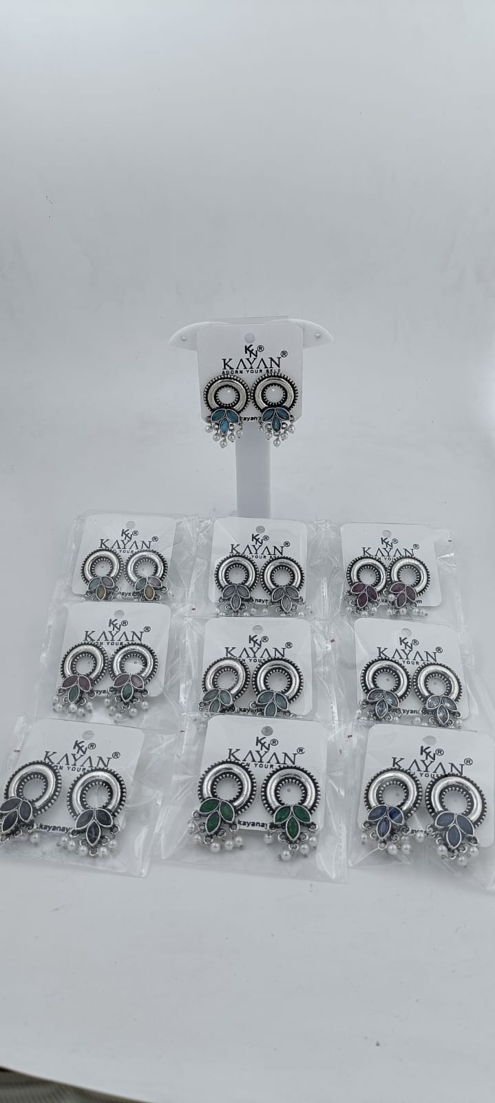 Designer Round silver Earrings  in Paris